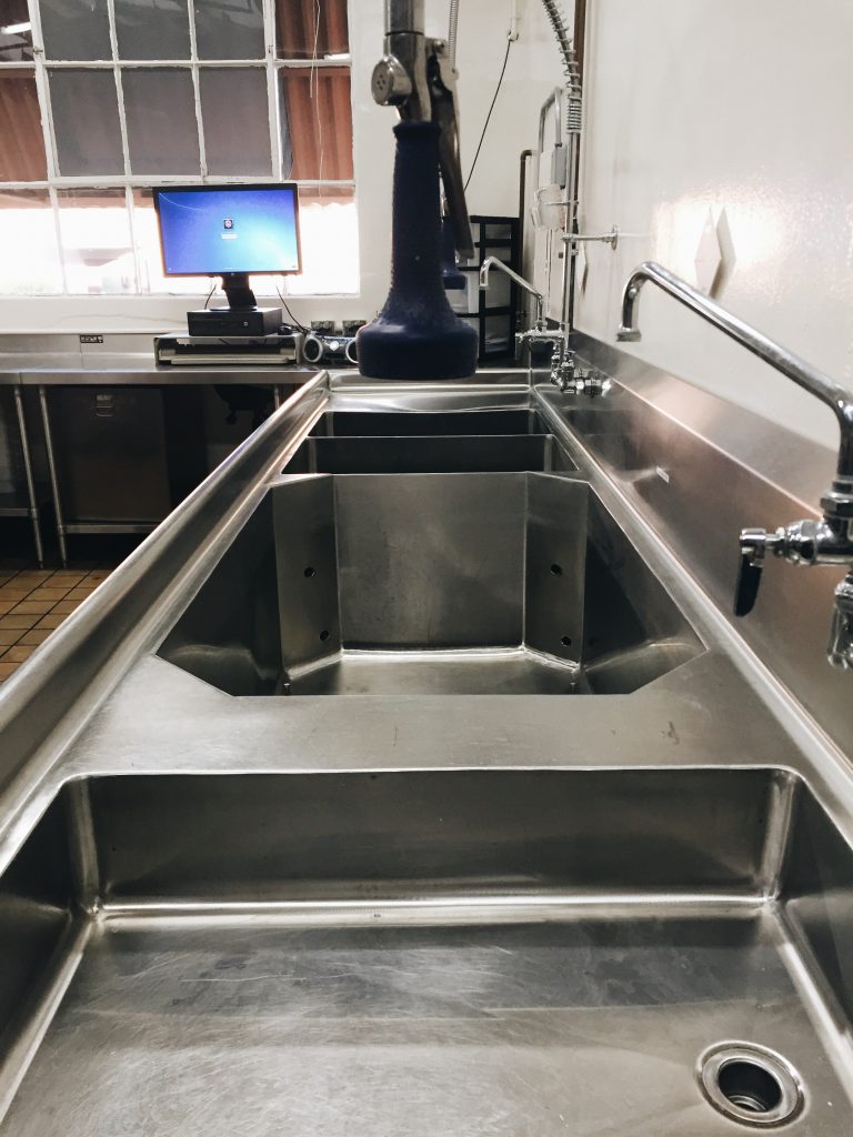 This is the AquaScrubber, the Nutrition Department’s fancy dishwasher! It takes a high-powered machine like this one to take care of all the dishes that need to be washed on a daily basis. 